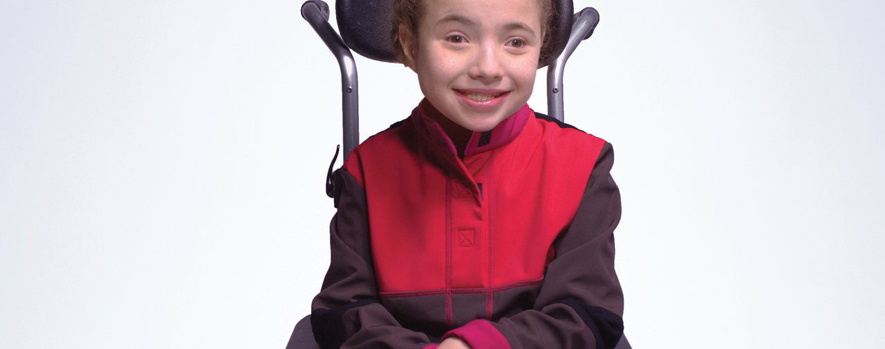 Un enfant «Beau en fauteuil roulant» 